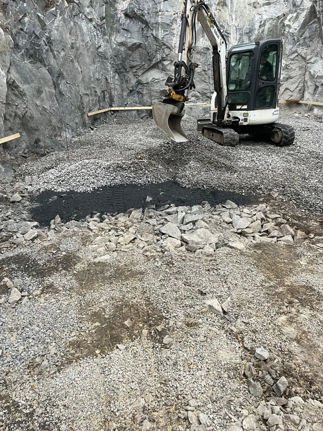 Excavator working on a building foundation